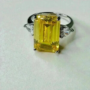 STERLING SILVER 4 CARAT CANARY YELLOW EMERALD CUT STONE W/BAGUETTES